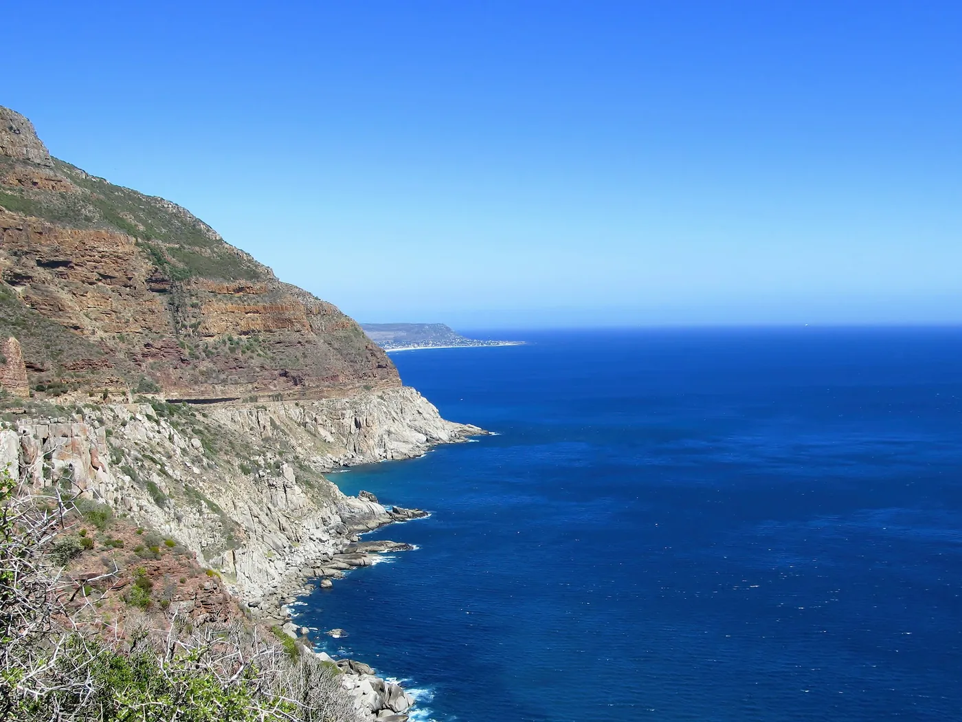Klikatá pobřežní silnice Chapman's Peak Drive